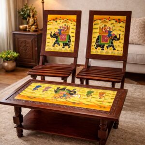 Rajasthani lounge set with 2 chairs and coffee table featuring hand‑painted royal elephant procession artwork in living room setting”