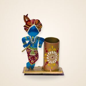 Krishna Pen Stand, on a cream background