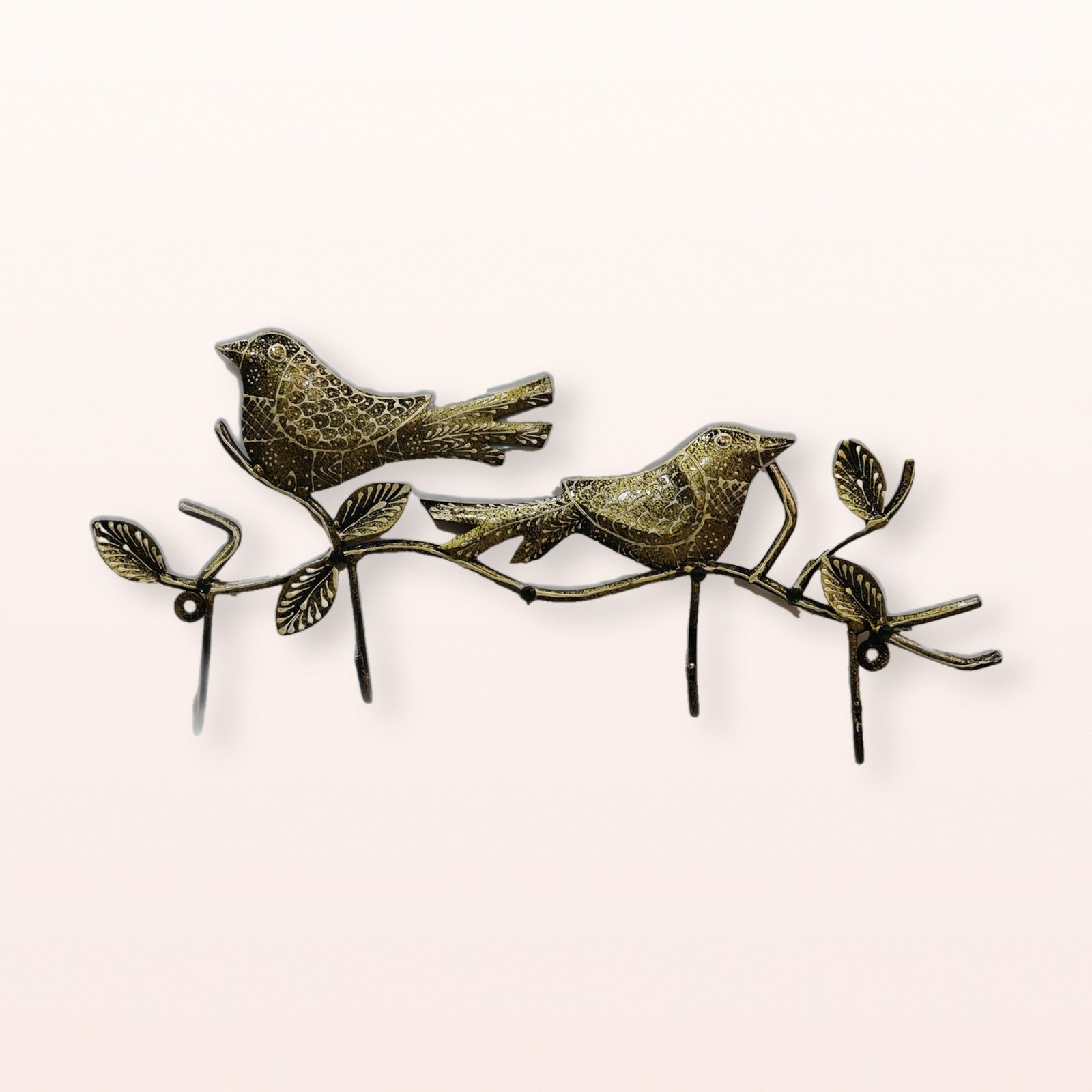 Bird Key Holder, on a soft blush background