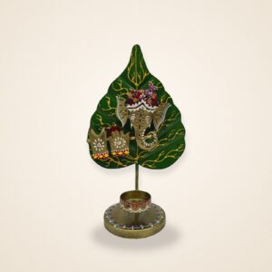 Ganesh Leaf Tealight Holder, on a cream background