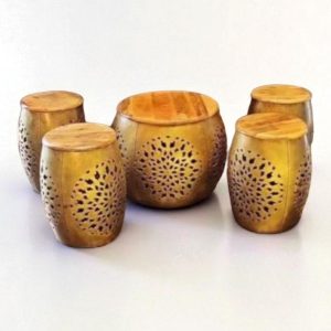Baithak set of four stools and a wide table on a white floor