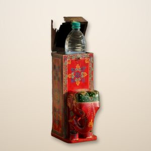 Handcrafted Wooden Bottle Holder with a water bottle inside and the lid open, on cream