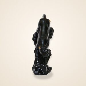 Black Panther figurine, on a cream background