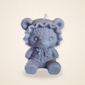 Cute Lady Bear Candle, on a cream background