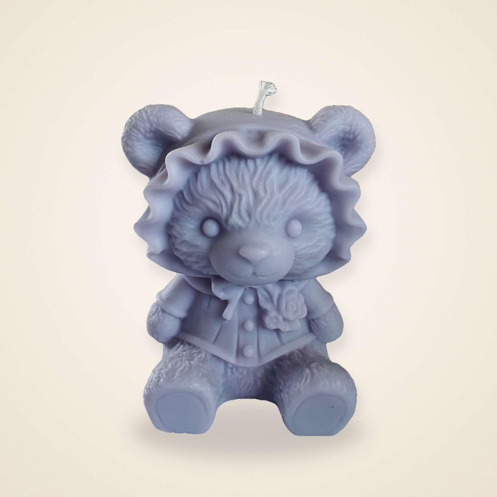 Cute Lady Bear Candle, on a cream background