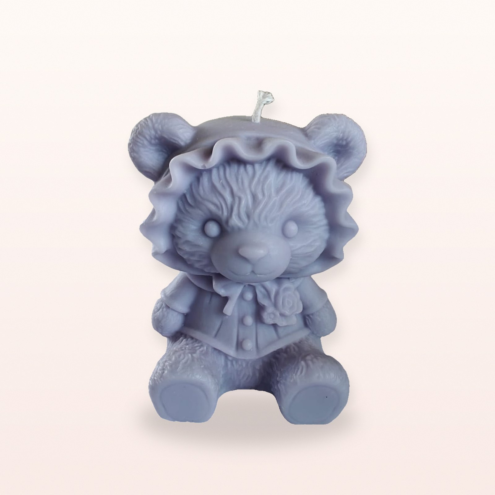 Cute Lady Bear Candle, on a soft blush background