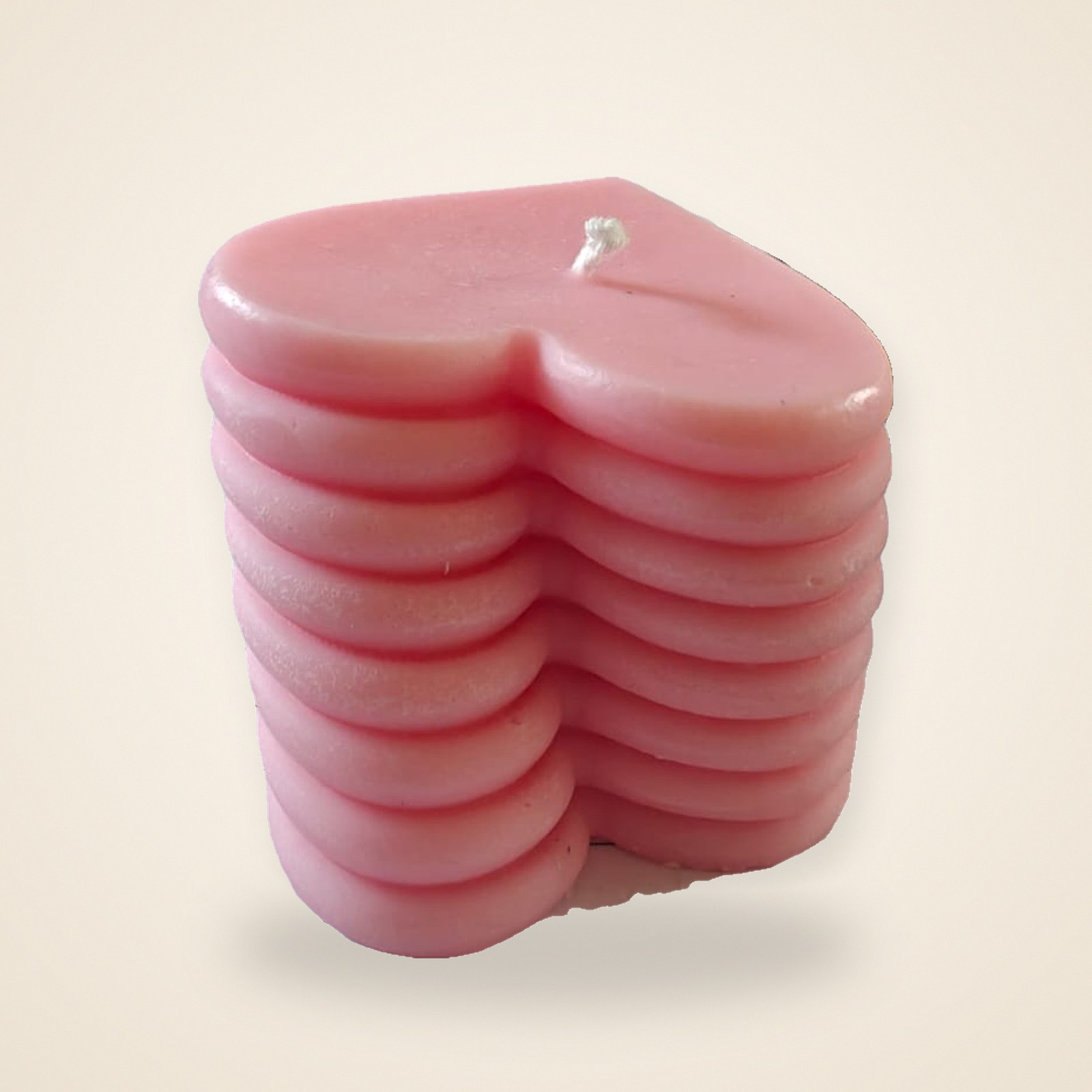 Heart Stack Candle, on a cream background