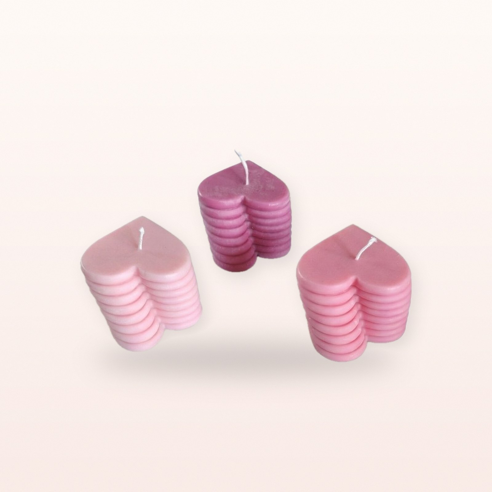 Heart Stack Candle, on a soft blush background