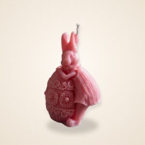 Easter Story Bunny Candle, on a cream background
