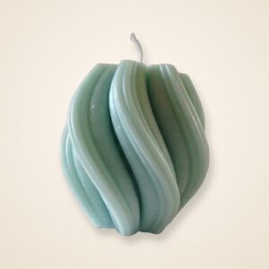 Spiral Wave Candle, on a cream background