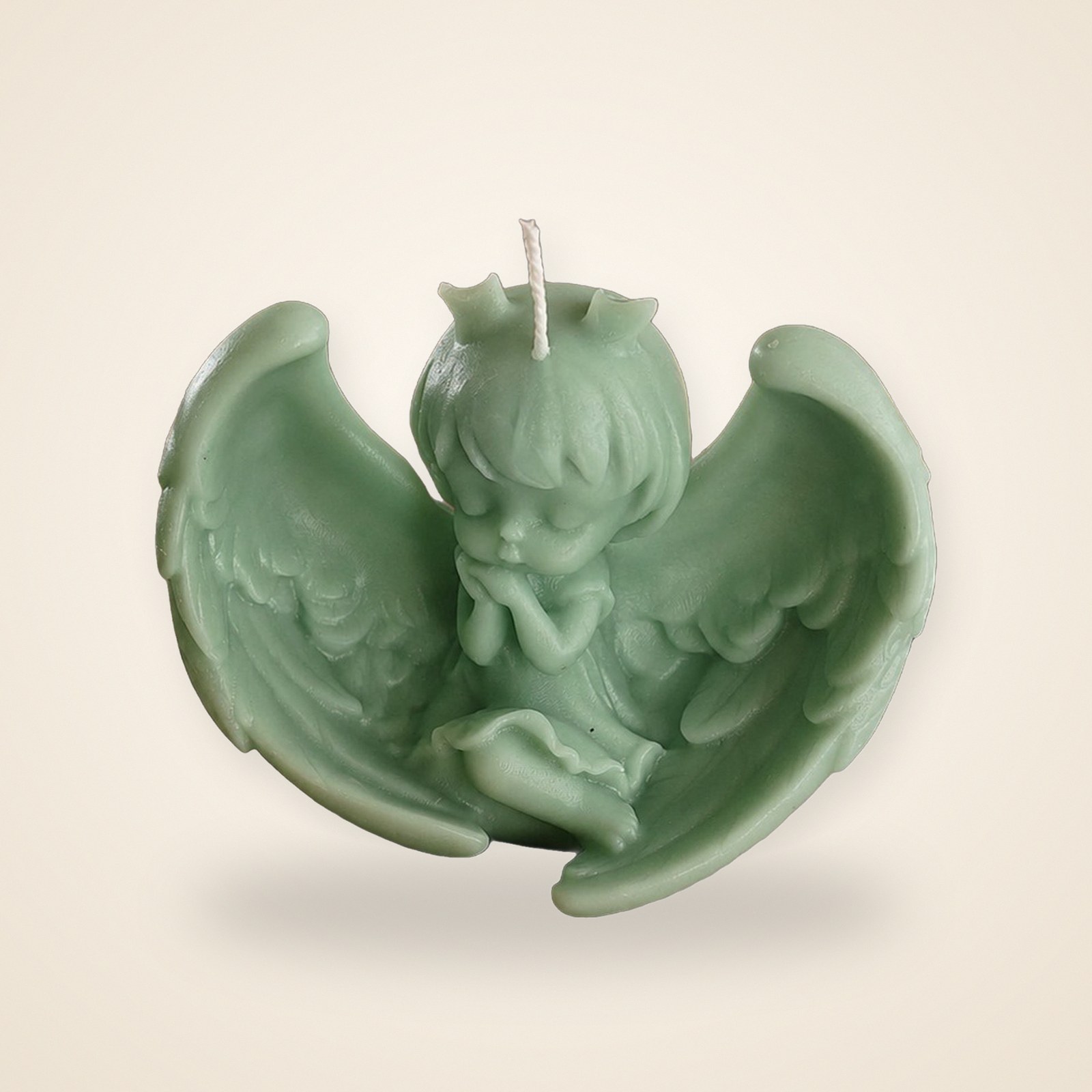 Angel with Wings Candle, on a cream background