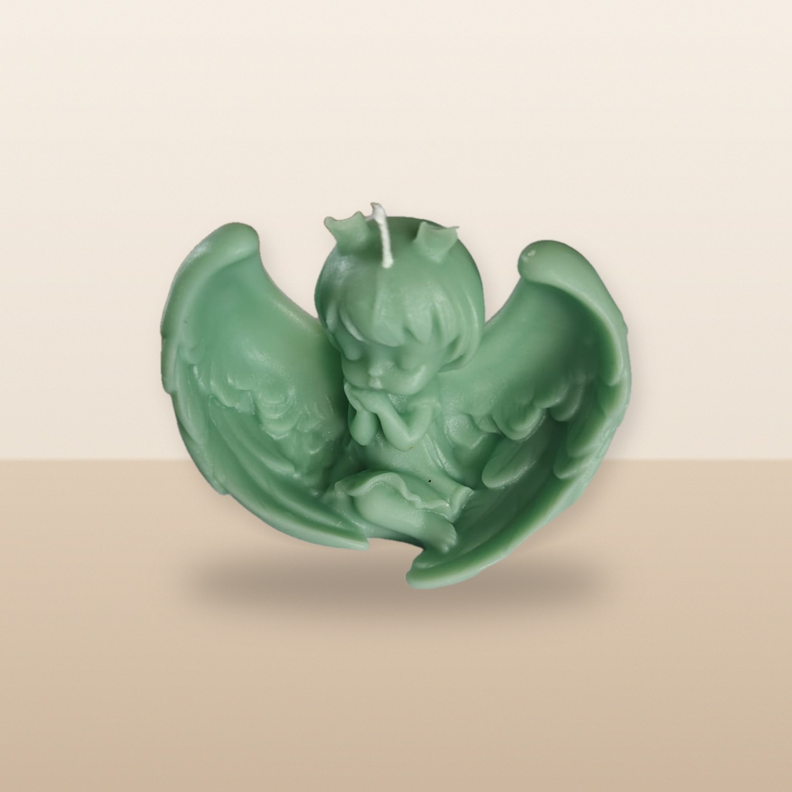 Angel with Wings Candle, on a tabletop