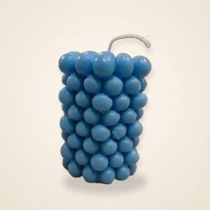 Blue Bubble Pillar Candle, on a cream background