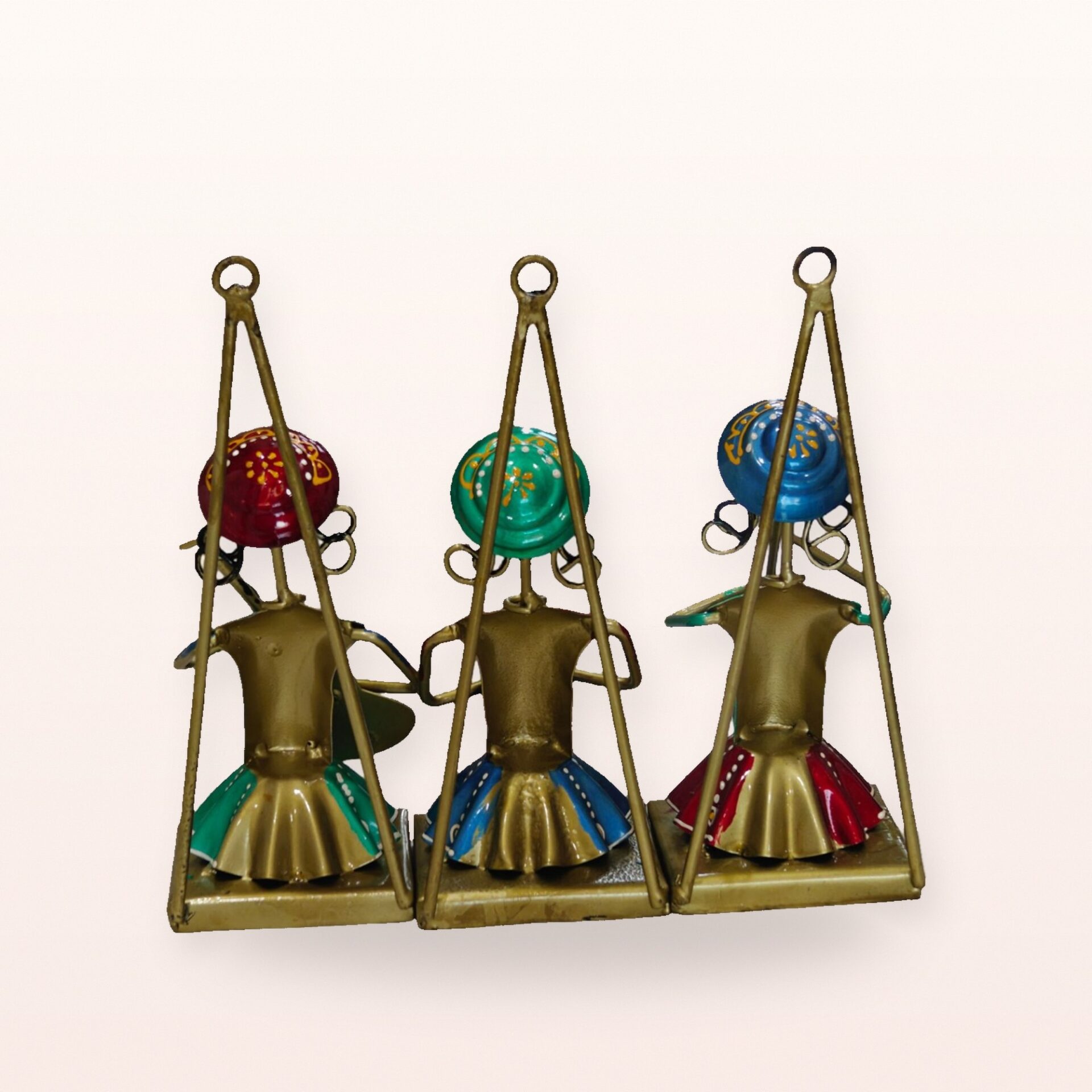 Back view of the three musicians on the swing