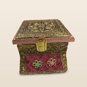Royal Treats embossed gift box with a glass jar, on a cream background